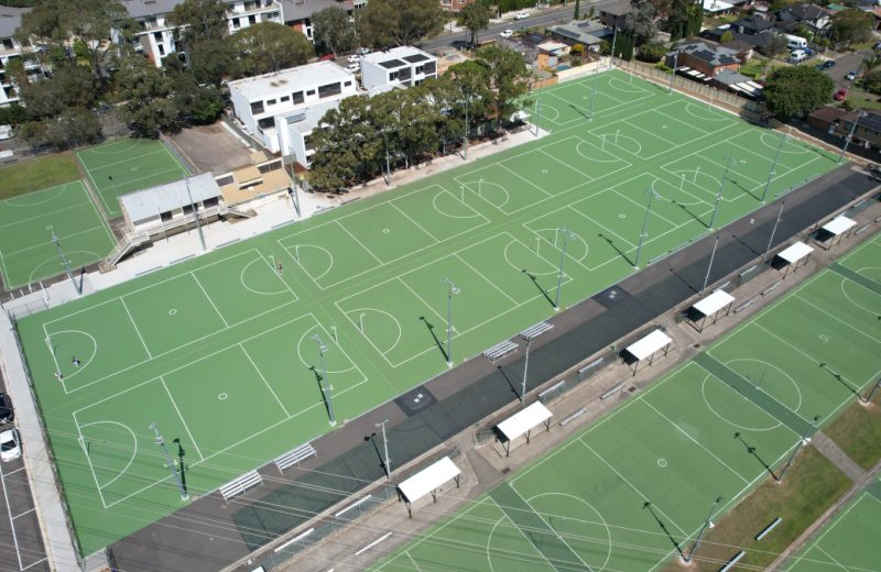 Image shows an ariel view of a series of netball courts constructed by Asphalt Australia